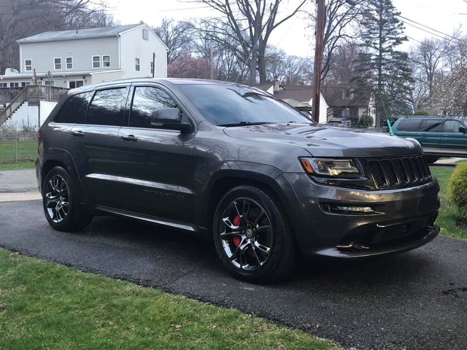 Gray Jeep Grand Cherokee SRT in a driveway